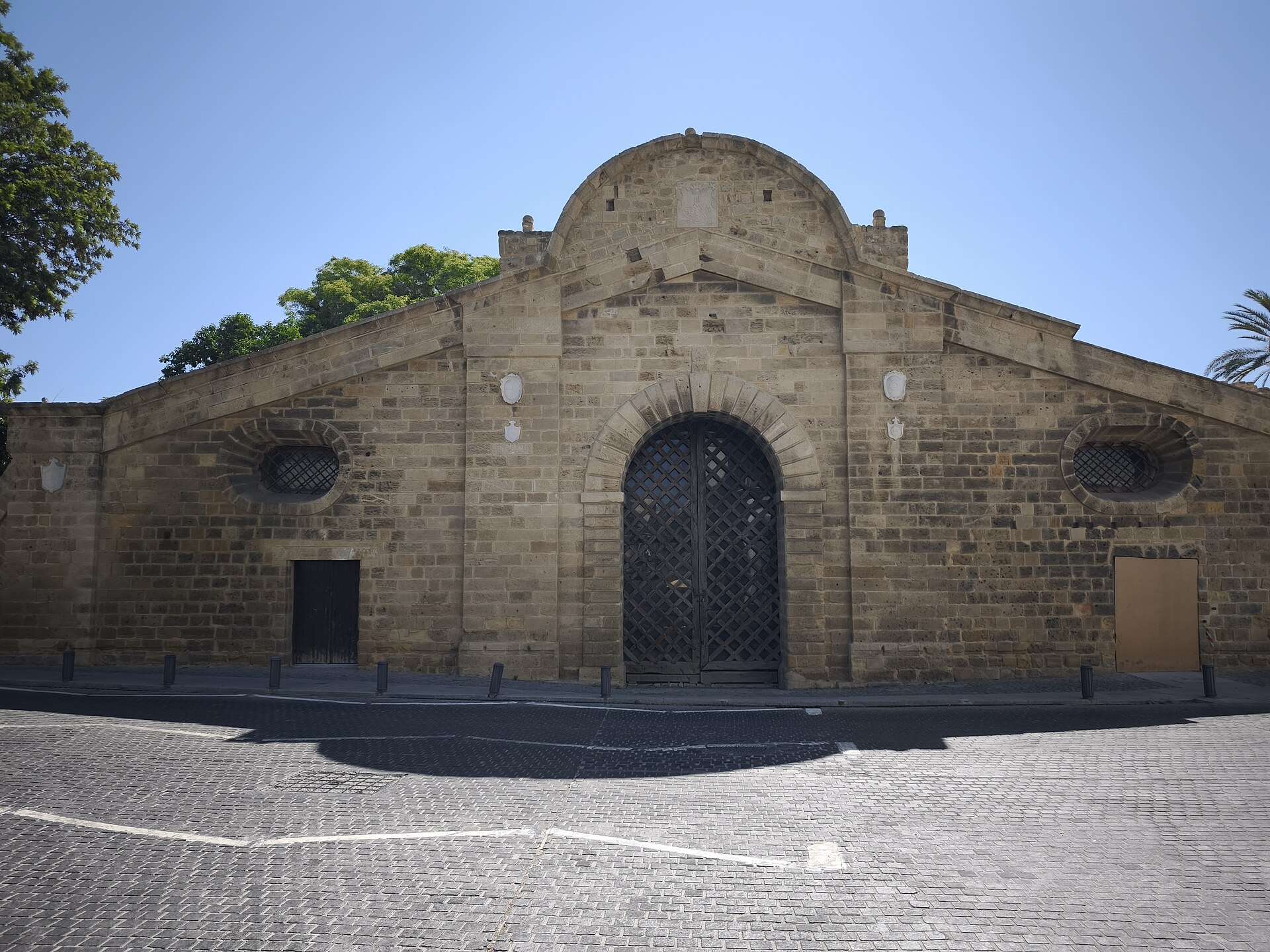 The stone arch and circular openings of Famagusta Gate in Nicosia's Venetian walls